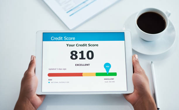 Do more with a good credit score Shot of an unrecognizable businesswoman holding a digital tablet showing her credit score credit score photos stock pictures, royalty-free photos & images