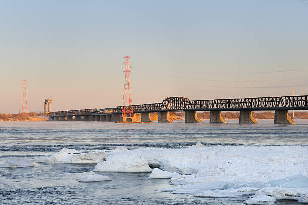istock Bridge at dusk with snow and ice 104151452