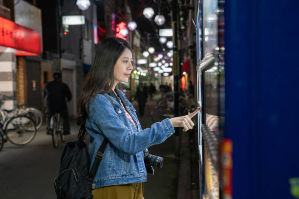 istock buying food from vending machine. 1041530594