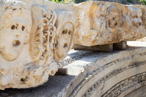 istock Theatrical mask relief, Myra, Demre Turkey 1041535164