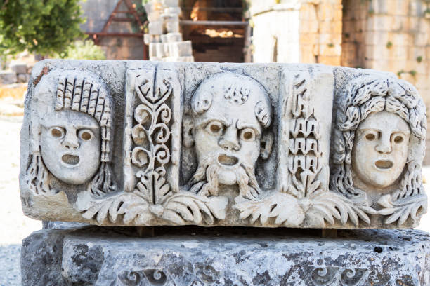 istock Theatrical mask relief, Myra, Demre Turkey 1041535170