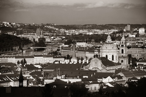 Prague skyline rooftop view with church and dome in Czech Republic.