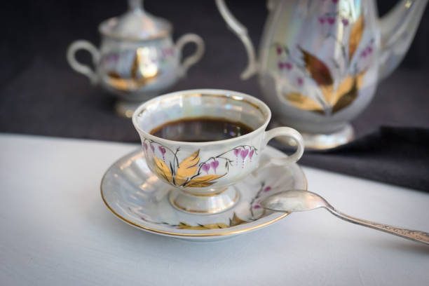 istock Still life with coffee in light porcelain on a dark background. 1041538850