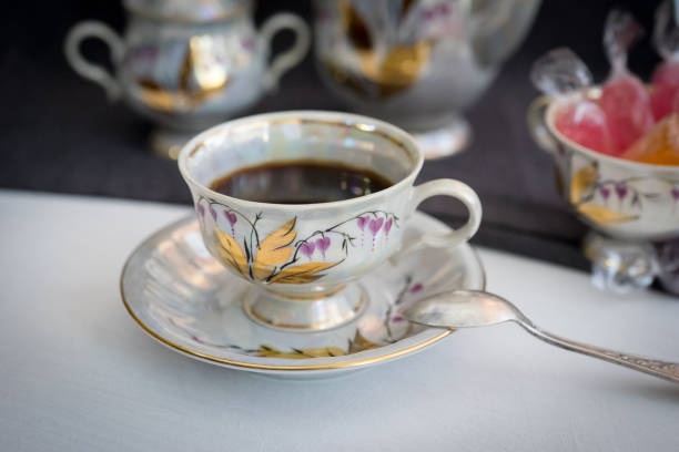 istock Still life with coffee in light porcelain on a dark background. 1041538972