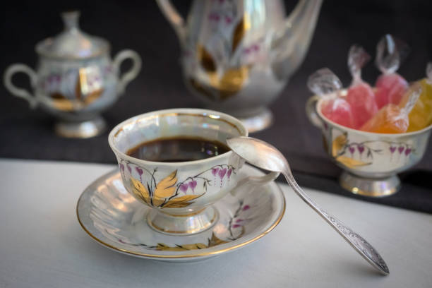 istock Still life with coffee in light porcelain on a dark background. 1041541044