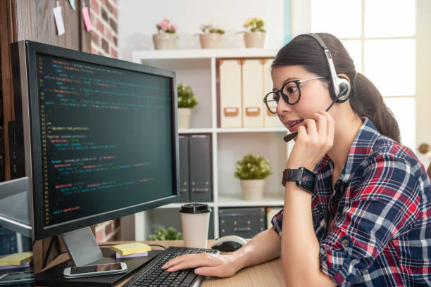 istock speaking to customer thru headphone 1041545284