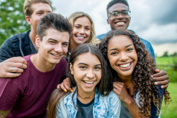 istock Teens smiling together for a group portrait 1041548008