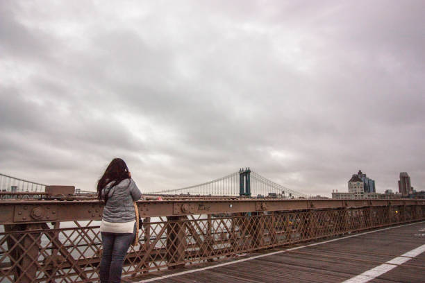 Manhattan, New York, US-January 07, 2025: The scenic views of Brooklyn Bridge in Manhattan on a freezing day, New York, US.