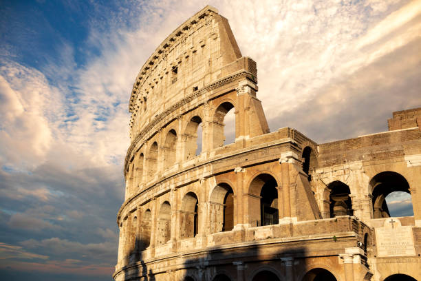 istock Rome Coliseum (colosseum) with beautiful dramatic sky on the background 1041554286
