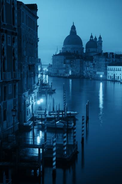 Striped mooring poles on the Grand Canal in Venice