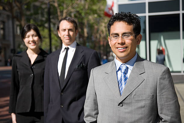 istock Young businessman with team - horizontal 104156655