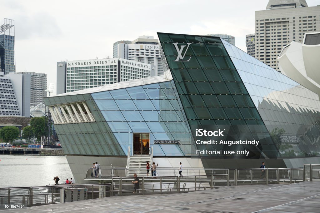 Modern Louis Vuitton Flagship Store On The Marina Bay Area With Singapore  Skyscraper Background Stock Photo - Download Image Now - iStock