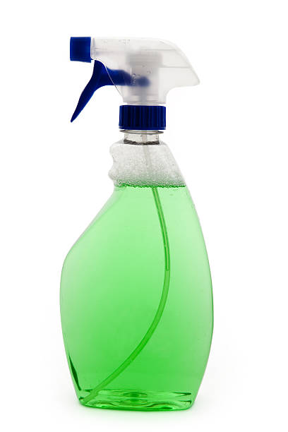 istock A clear spray bottle containing a green cleaning fluid 104157474
