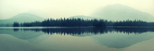 istock Foggy mountain lake 1041591044