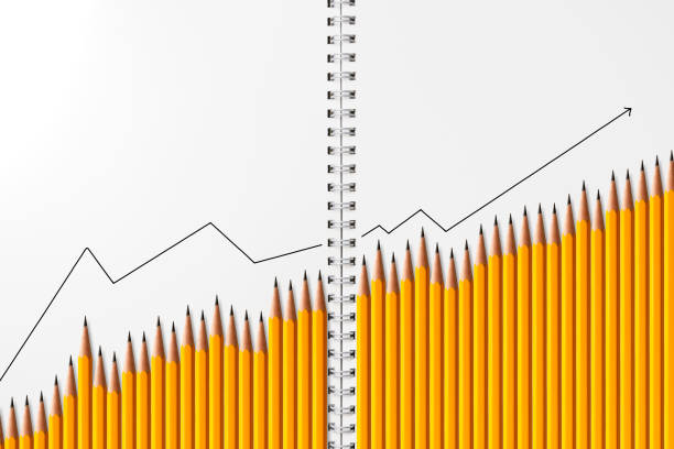 istock Yellow pencils increasing chart on sketchbook background. 1041615302