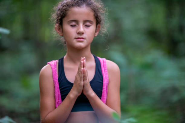 istock Meditating Girl 1041616422