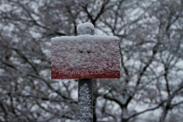 istock Snow covered red railway sign 1041619972