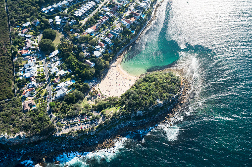Sydney, Australia - October 30, 2022: Beautiful skyline view from Milk Beach with blue sky.