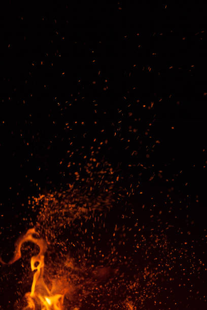istock Fire flame and sparks isolated on  black background 1041622820