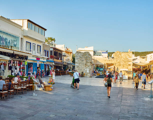 people walking in the carsi mahallesi, cevat sakir square at bodrum downtown. mugla province, turkey. - mugla province imagens e fotografias de stock