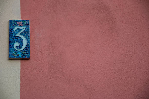 istock Blue Number three in pink wall background. 1041627438