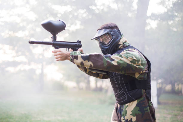 istock Paintball player in smoke 1041638238