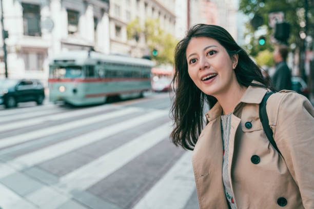 istock woman smiling and feeling curious while traveling 1041652628