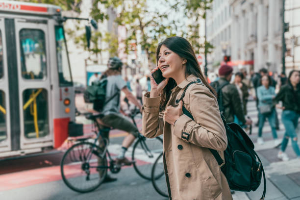 istock woman talking in phone in busy working day 1041652748