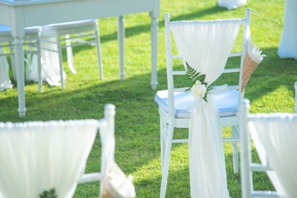 istock Chair decorated with flowers in Wedding ceremony. 1041654246