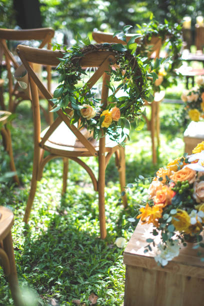 istock Chair decorated with flowers in forest Wedding ceremony. 1041657266
