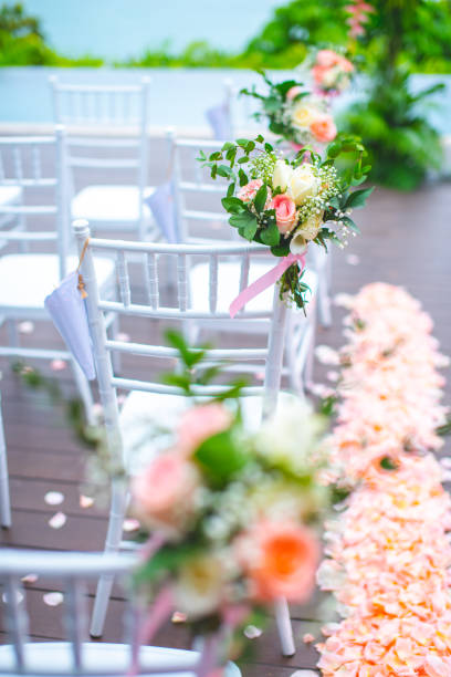 istock Chair decorated with flowers in Wedding ceremony. 1041657650