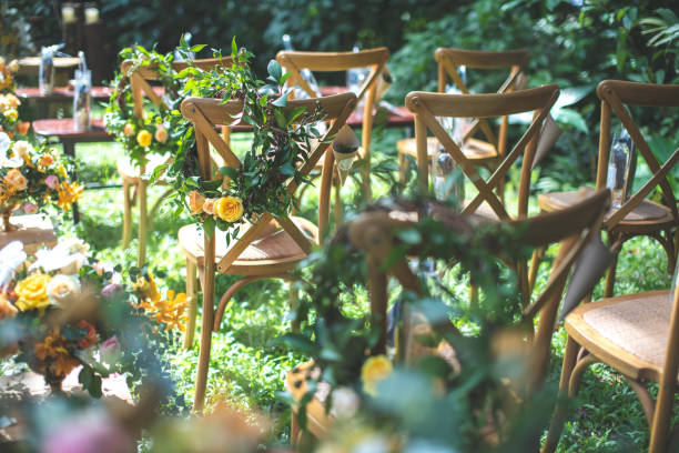 istock Chair decorated with flowers in forest Wedding ceremony. 1041658194