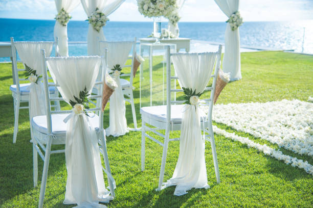 istock Chair decorated with flowers in Wedding ceremony. 1041658224