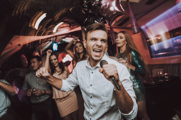 istock Sing in Karaoke. Men. Karaoke Club. Have Fun. 1041685104