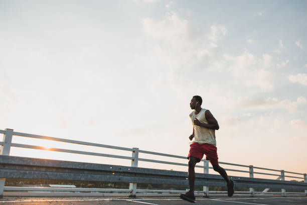 istock Young African-American male jogging 1041690734