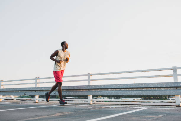 istock Young African-American male jogging 1041690740