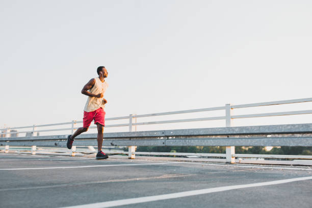 istock Young African-American male jogging 1041690742