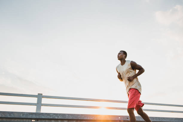 istock Young African-American male jogging 1041690746