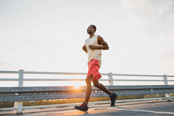 istock Young African-American male jogging 1041690784