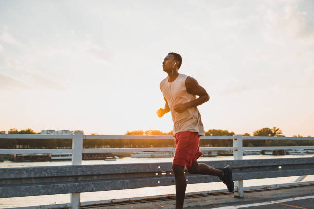 istock Young African-American male jogging 1041690834
