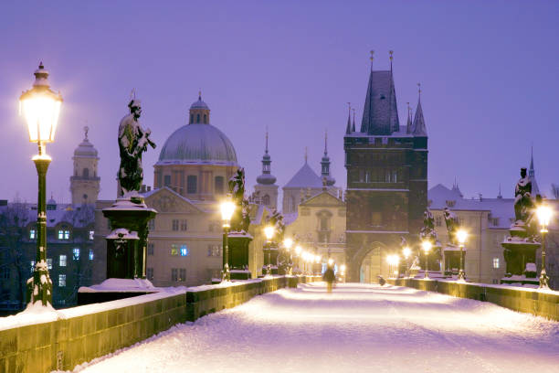 winter snowy Charles bridge, gothic Old Town bridge tower,Old town district, Prague (UNESCO), Czech republic, Europe stock photo