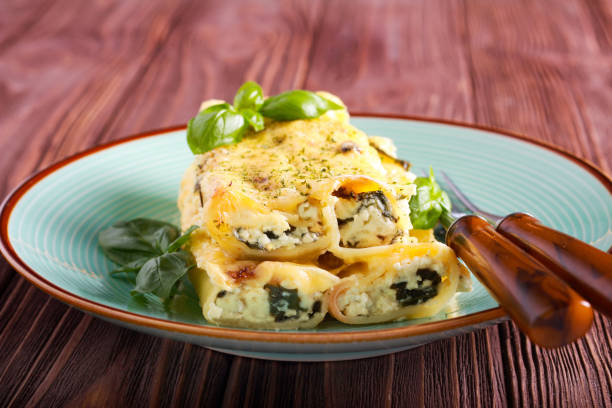 istock Ricotta cheese and spinach filling cannelloni 1041696650