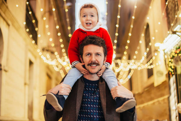 istock Father and son watching the Christmas lights 1041696728