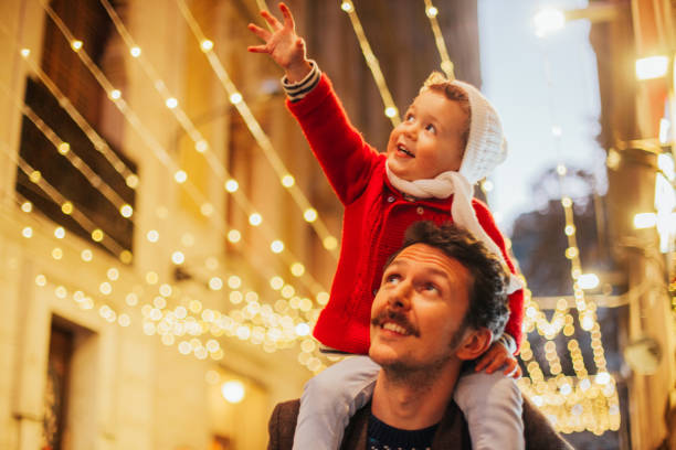 istock Father and son watching the Christmas lights 1041696810