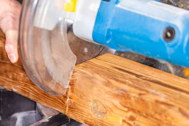 istock Close up from a buzz saw cuts a wood 1041701292