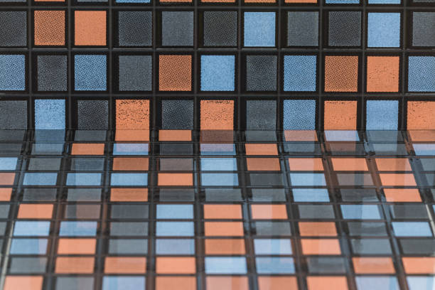 istock Black blue gray and orange Mosaic Tiles abstract background 1041708218