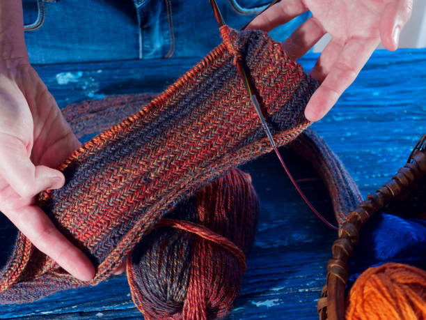 istock Human hands holding the knitting 1041708800