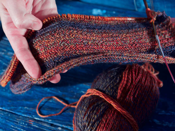 istock Human hands holding the knitting 1041709048