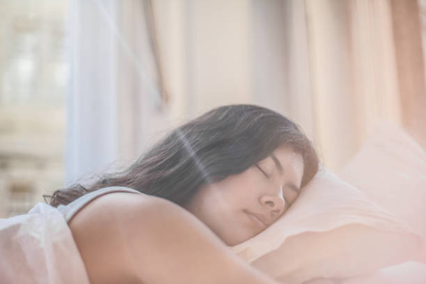 istock Girl sleeping in her bed. 1041725578