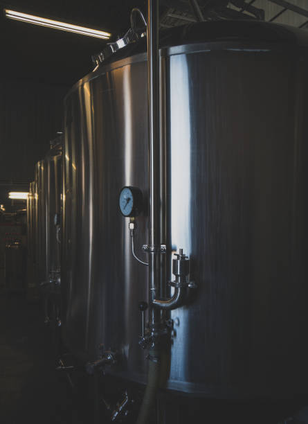 istock Stainless tanks for fermentation in a beer brewery. 1041727152